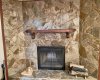 Wood burning Fireplace with Stone tiling
