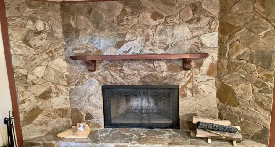 Wood burning Fireplace with Stone tiling