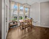 A spacious dining nook with built in seating and room for a full sized table.
