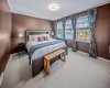 The oversized primary retreat easily accommodates a king bed and additional furniture.