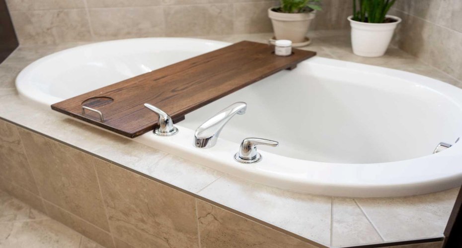 The corner soaker tub creates a relaxing focal point in the primary ensuite.