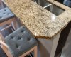 Granite counters add durable, polished surfaces throughout the kitchen and bathrooms.