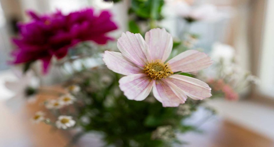 A delicate floral detail reflects the care found throughout the home and gardens.