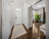 A bright and welcoming foyer introduces the open, functional main floor layout.