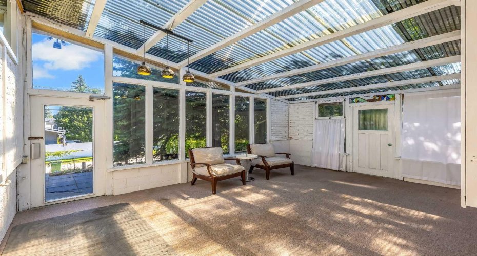sun room , access to private  backyard