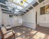 sun room , access to the garage and backyard