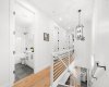 Upper floor features hardwood