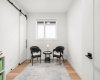 2 upper bedroom with barn door to closet
