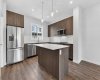 40 Creekside Way, Calgary, Alberta T2X 6E2, 3 Bedrooms Bedrooms, ,3 BathroomsBathrooms,Residential,For Sale,Creekside,A2329248