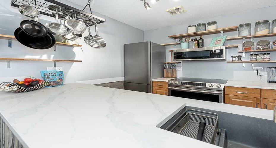 93 Grier Place, Calgary, Alberta T2K 5Y5, 3 Bedrooms Bedrooms, ,2 BathroomsBathrooms,Residential,For Sale,Grier,A2329346