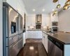 Stone backsplace with pot filler