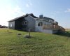 Whole exterior of home has been sided in metal (gun metal grey)