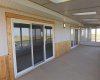 2 triple pane patio doors to enter the sun-room.