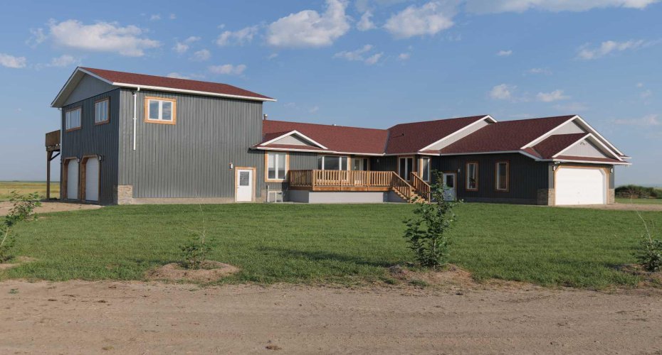 Double over sized garage south facing. East facing deck fully skirted with smart panel.