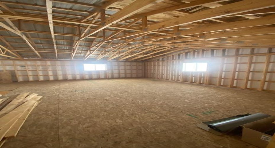 West upper level of shop/ vaulted