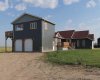 8 ft garage doors. Rock corners on both garages.