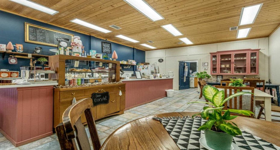 B- open layout with door to back kitchen