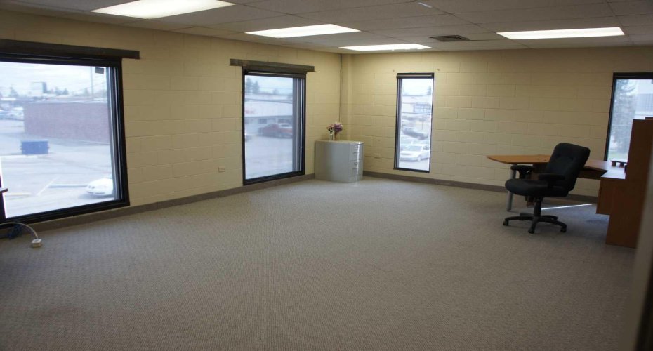 CORNER OFFICE WITH LOTS OF WINDOWS